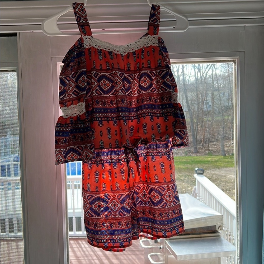 One piece romper outfit, it has tank top sleeves and also half sleeves